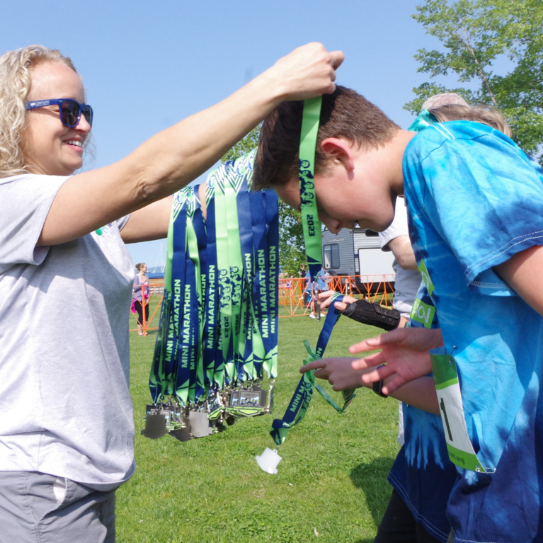 a Boy crossing the finish line